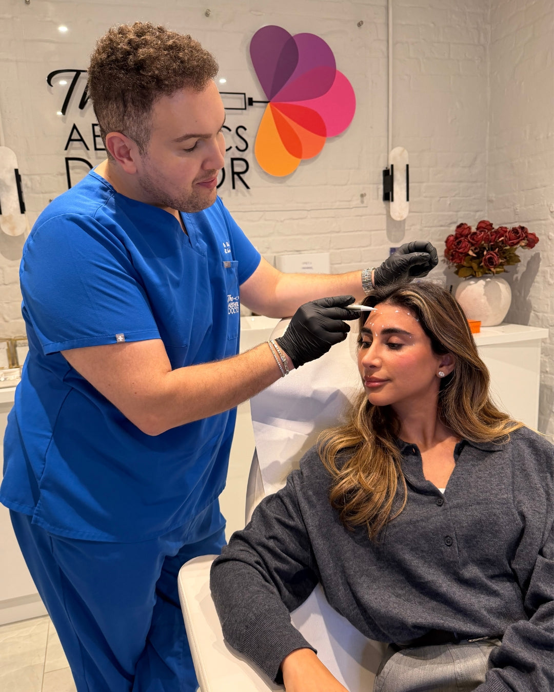 Dr Ahmed performing Anti-Wrinkle treatment